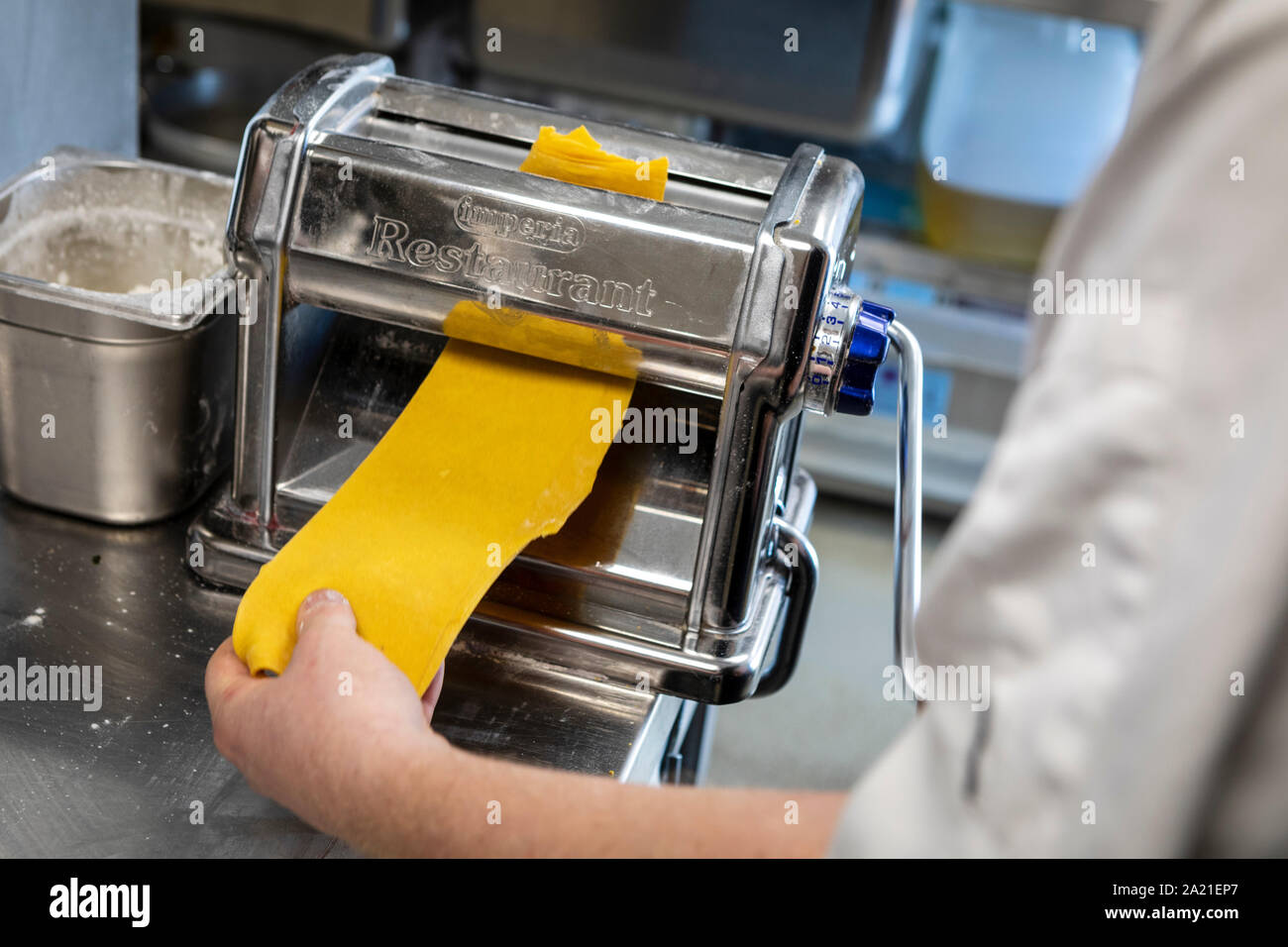 Rolling out handmade pasta Stock Photo