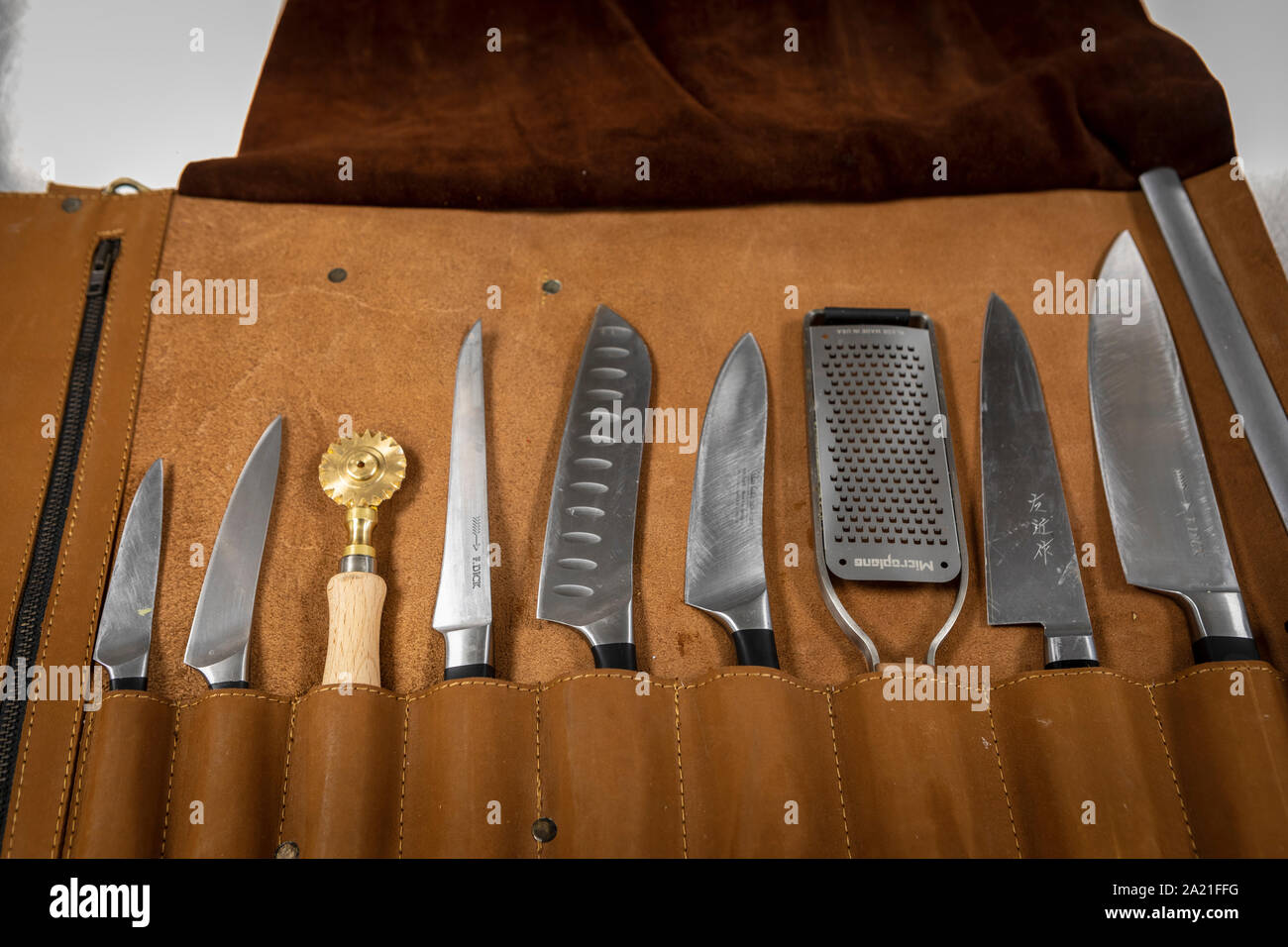 Cook's knives in kitchen of restaurant Stock Photo