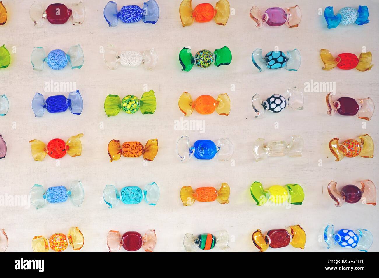 Wall display of decorative candies made of Murano glass Stock Photo