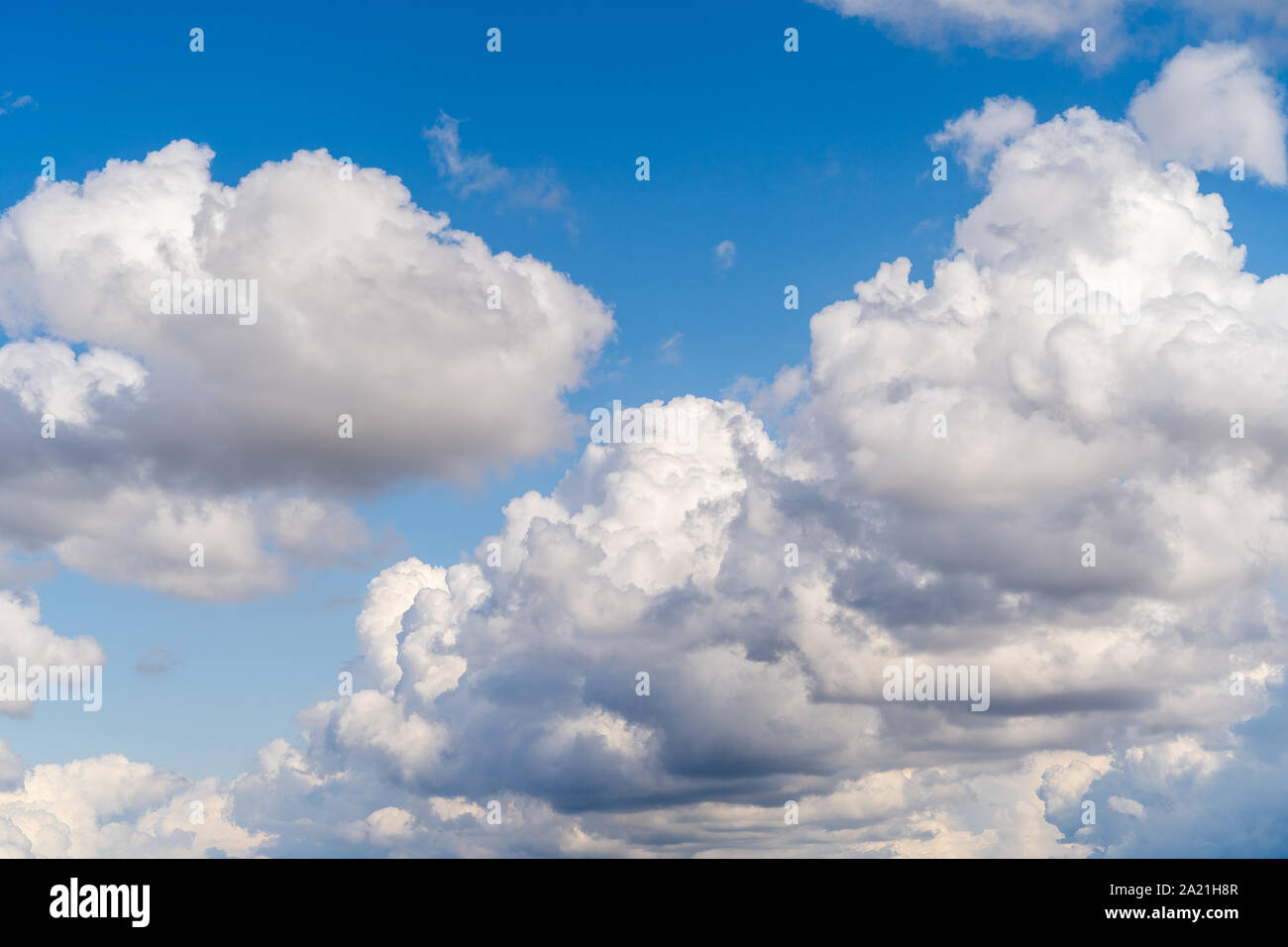 beautiful blue sky with white textured fluffy clouds background Stock ...