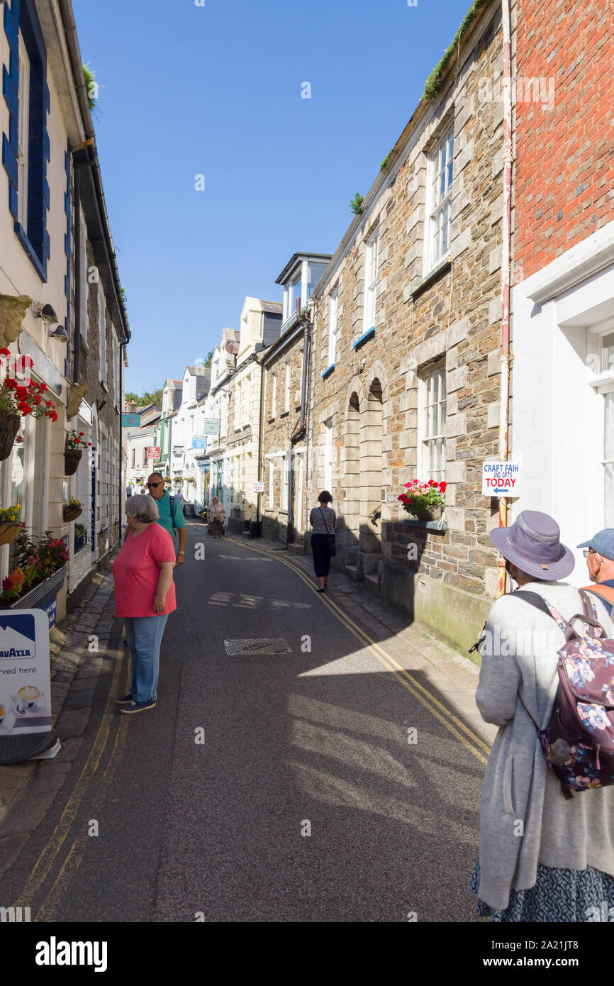 Shoppers and tourists on Church Street one of the narrow streets in