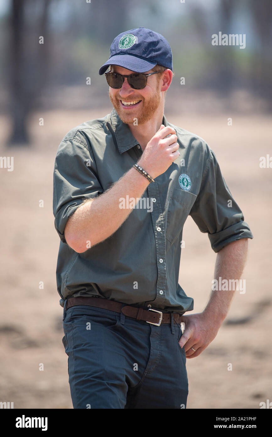 The Duke of Sussex watches an anti-poaching demonstration exercise conducted jointly by local rangers and UK military, at Liwonde National Park, Malawi. Stock Photo