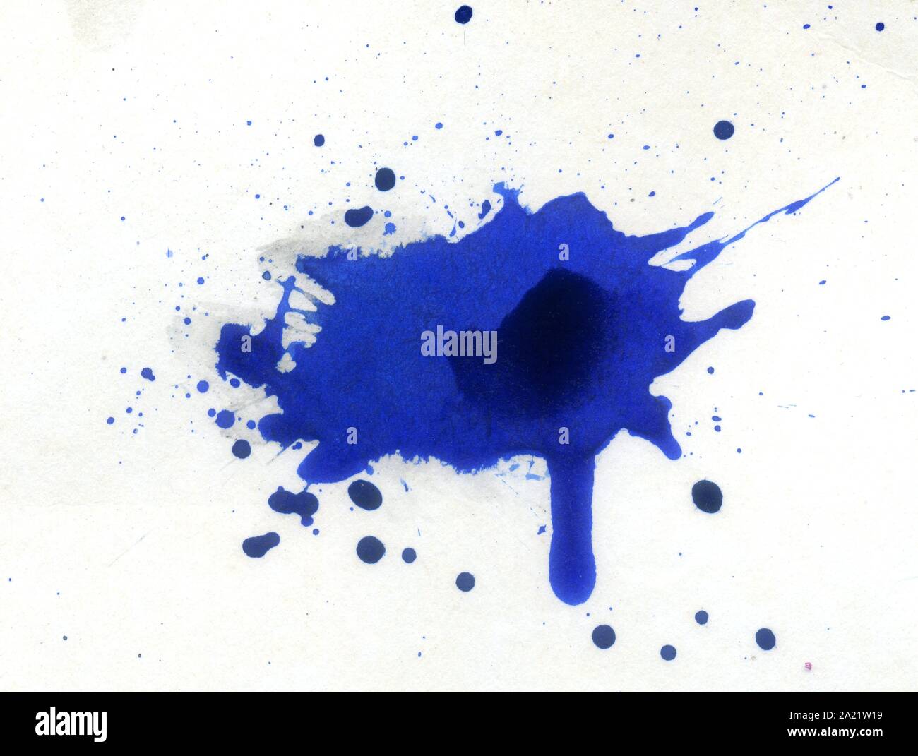 Abstract blue dried ink splashes or inkblots on white paper Stock Photo ...