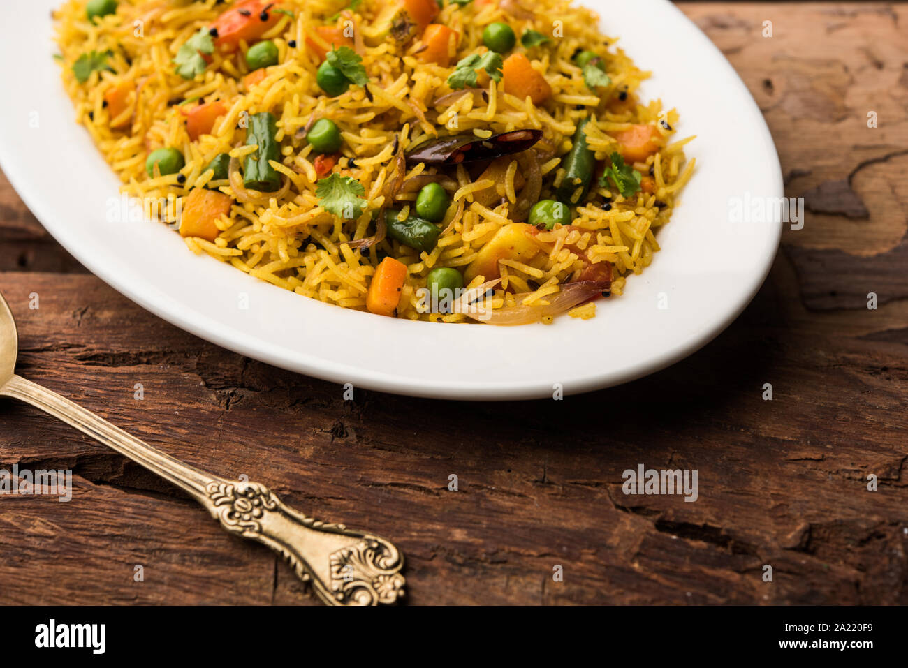 Tawa Pulao/Pulav/Pilaf/Pilau is an Indian Street Food made using basmati rice, vegetables and