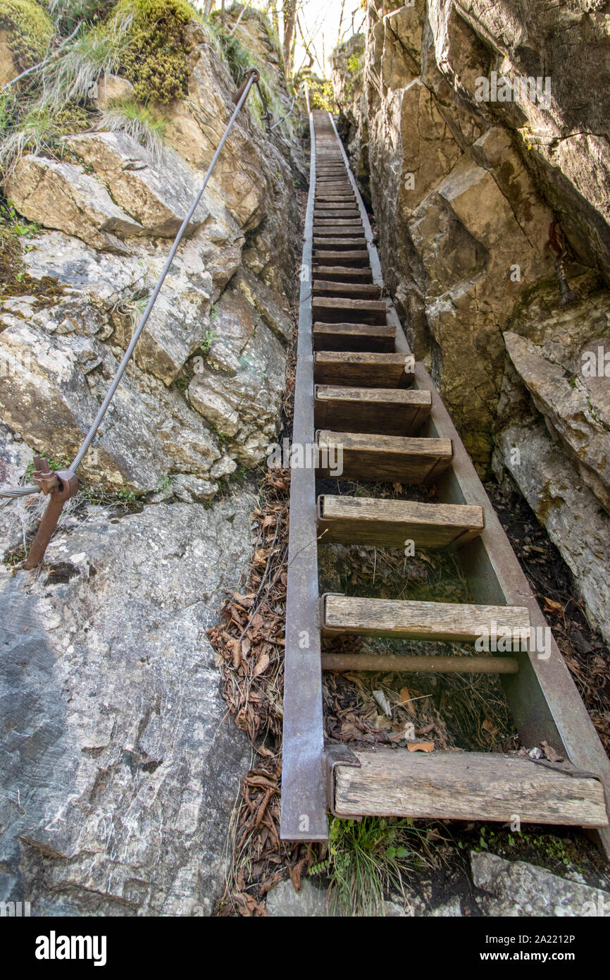 Steep stairs throw narrow corridor Stock Photo Alamy