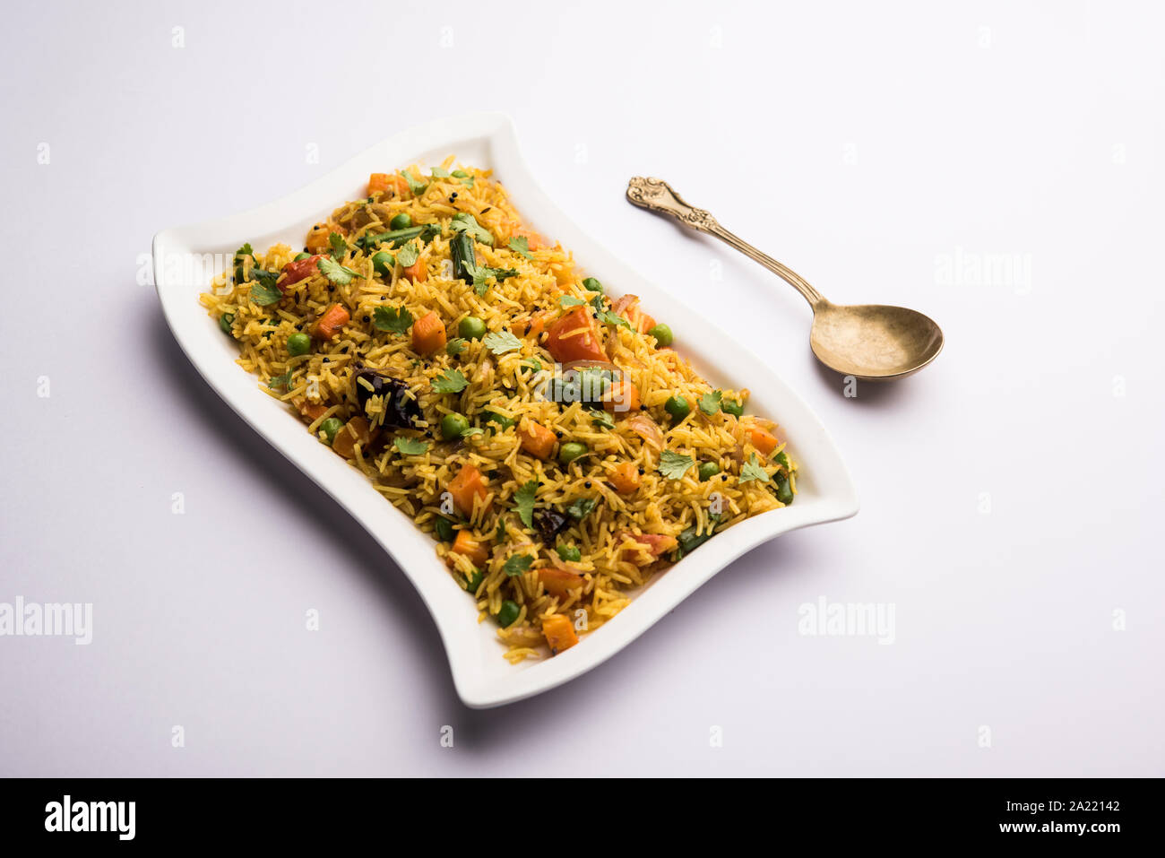 Tawa Pulao/Pulav/Pilaf/Pilau is an Indian Street Food made using basmati rice, vegetables and