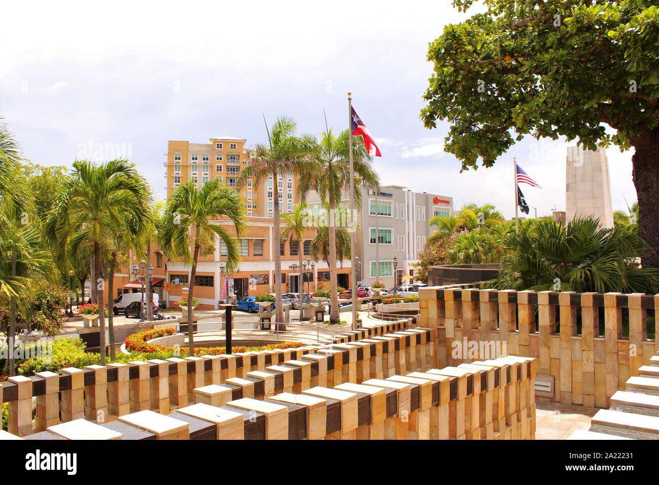 View of a small plaza in front of some local businesses, situated opposite the Capitol Government building in San Juan, Puerto Rico. Stock Photo