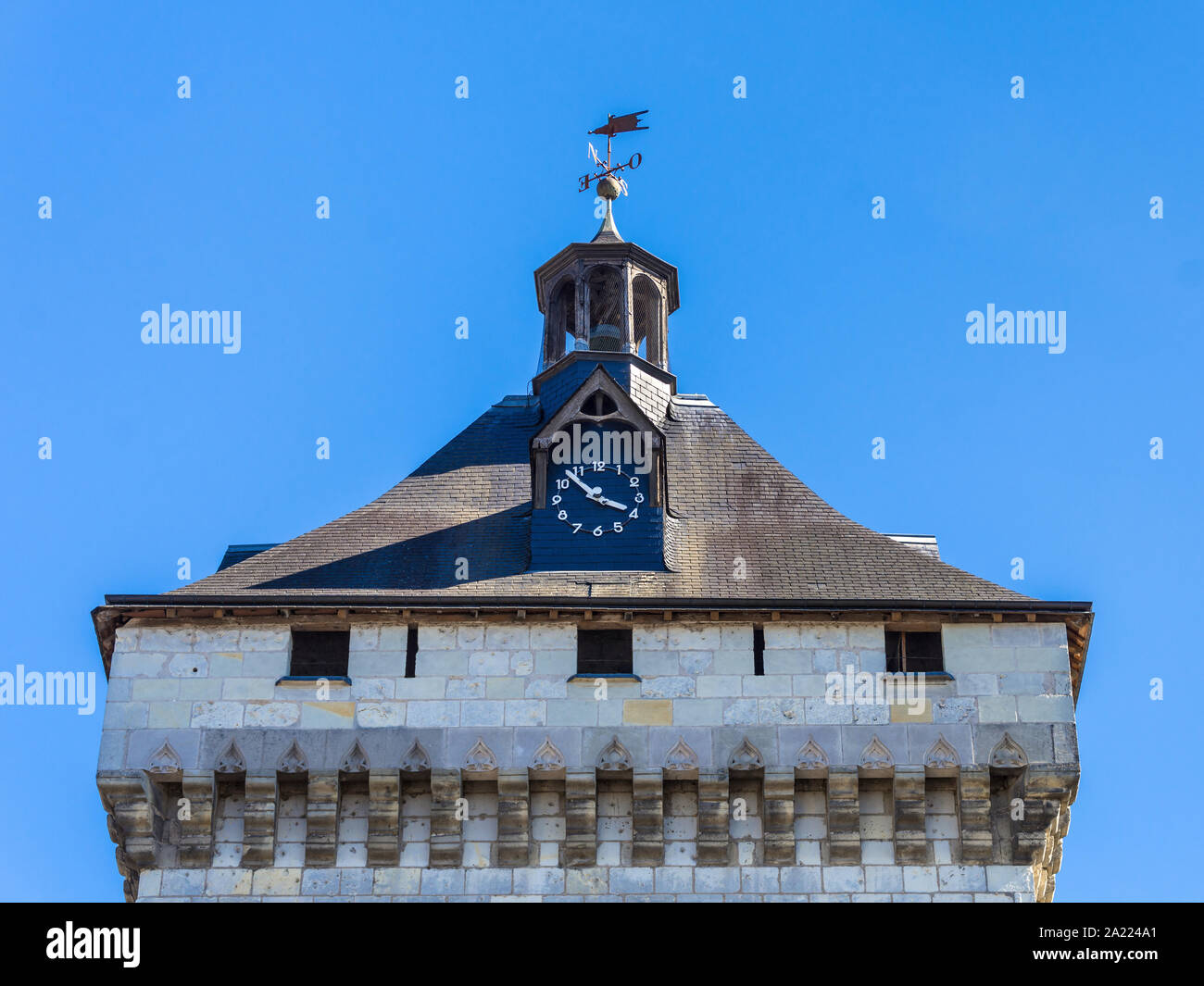 Clock above Porte Picoys defensive tower, Loches, Indre-et-Loire, France. Stock Photo