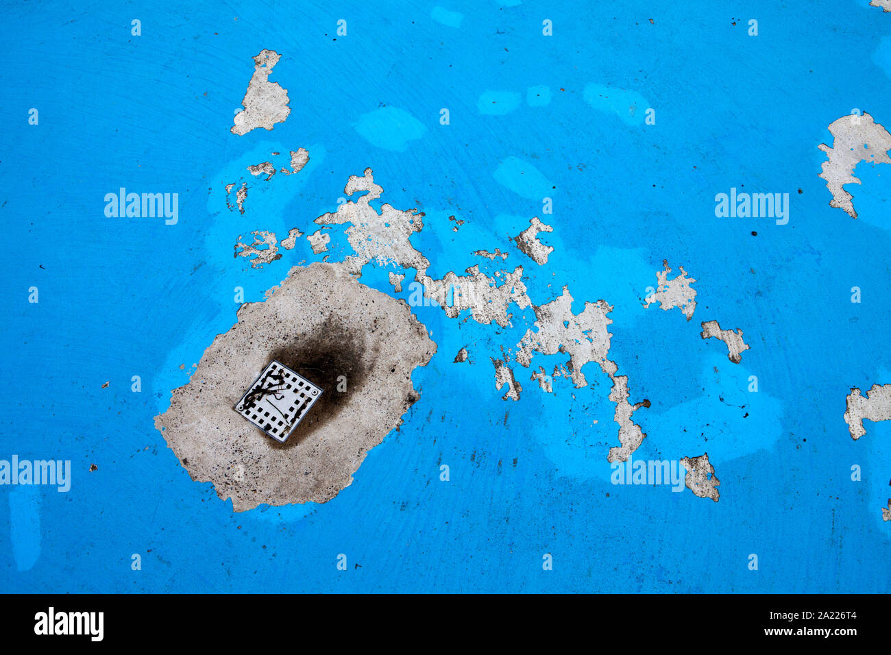 The drain of an old swimming pool Stock Photo