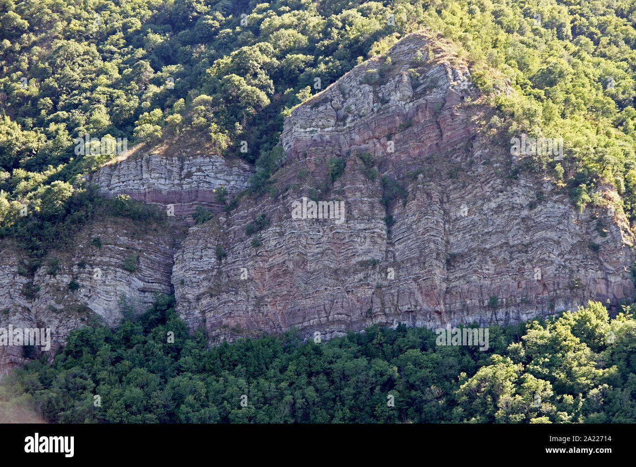 View of rocky cliff between Boljetin and Donji Milanovac from the Danube River, border between Romania and Serbia, Boljetin / Donji Milanovac, Serbia. Stock Photo
