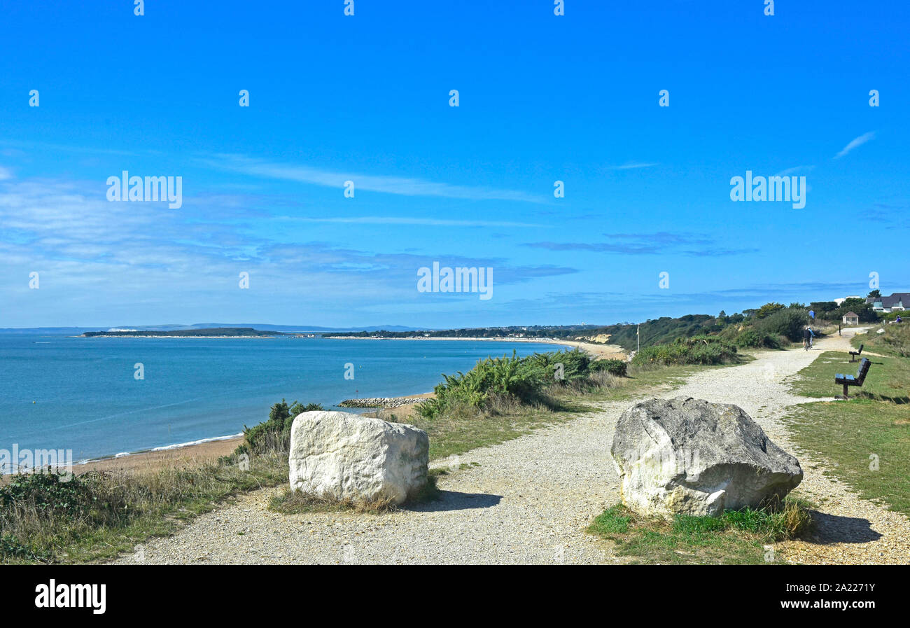 Highcliffe - Dorset - clifftop pathway - overlooking the bay -  inviting to walk - blue sea and sky - summertime Stock Photo