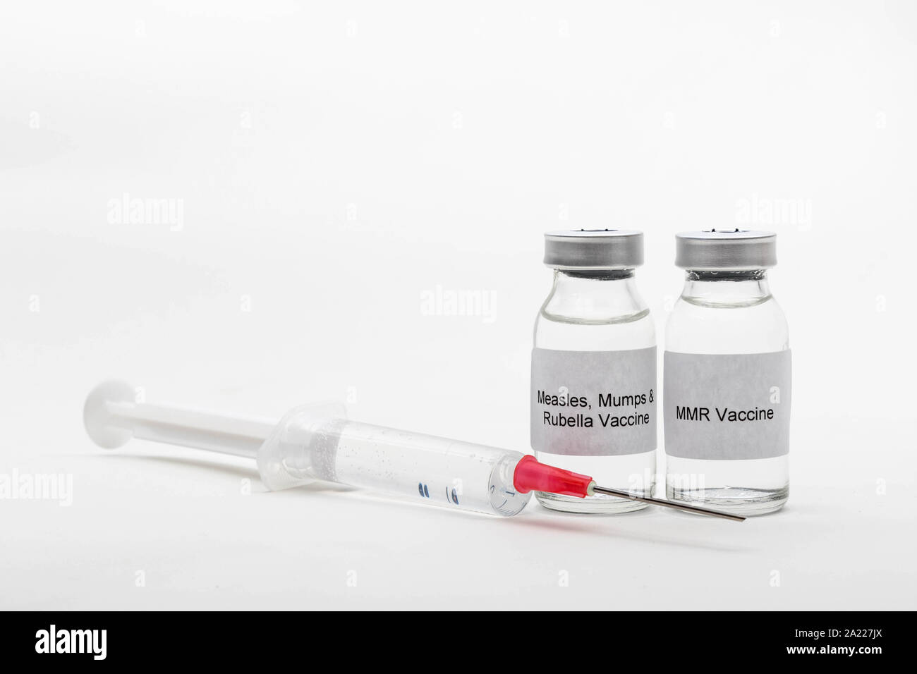 Medical concept showing medical 2 medical vials reading MMR Vaccine and ...