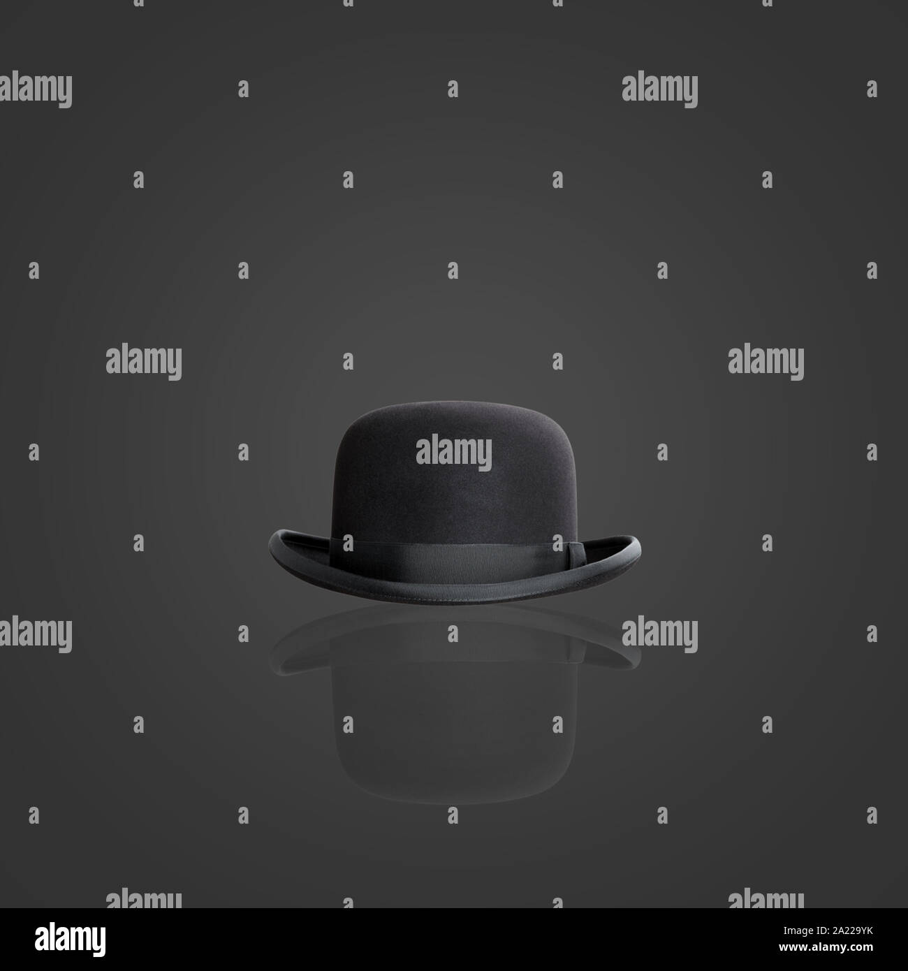 black hat on black background Stock Photo