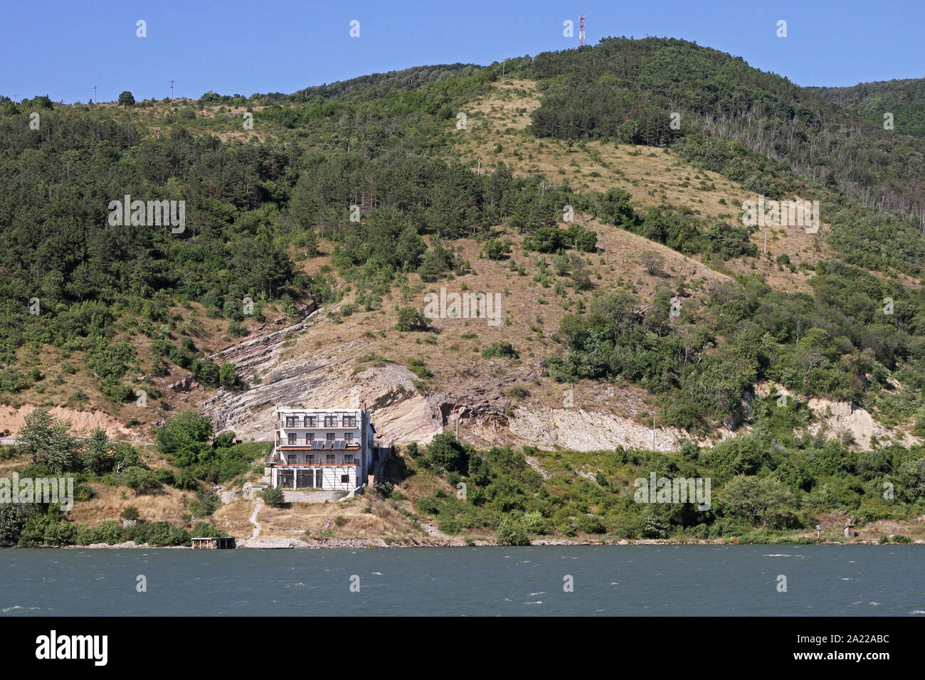 Large house on the Romanian bank of the Danube River, border between Serbia and Romania, Svinita; Romania. Stock Photo