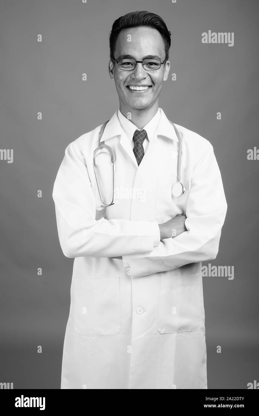 Happy confident doctor man Black and White Stock Photos & Images - Alamy