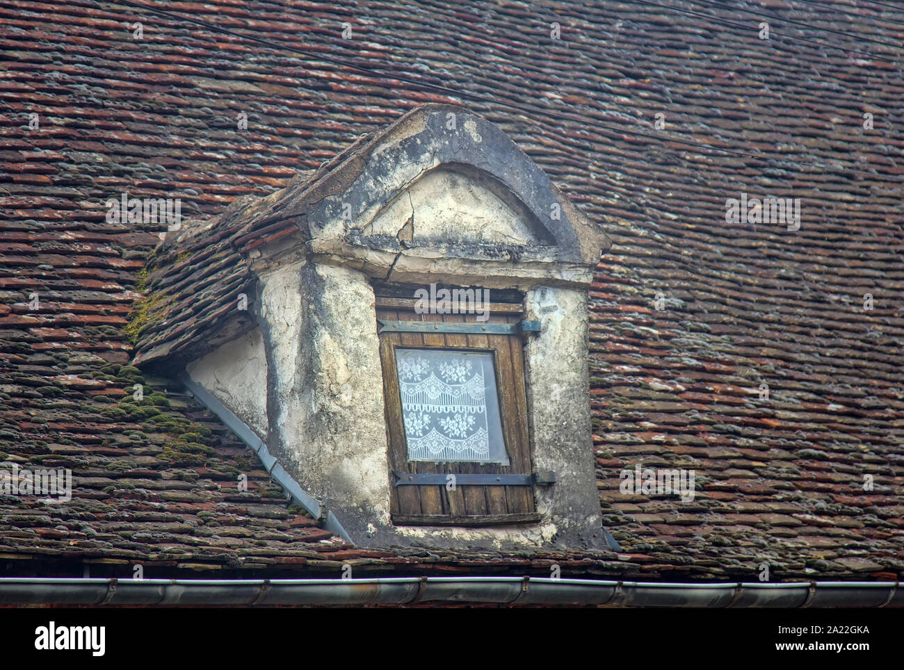 The Dormer Window And The Tiled Roof Of The Old House Dijon