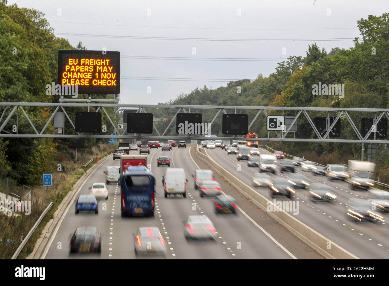 A matrix sign over the M3 motorway near Camberley, Surrey, warms