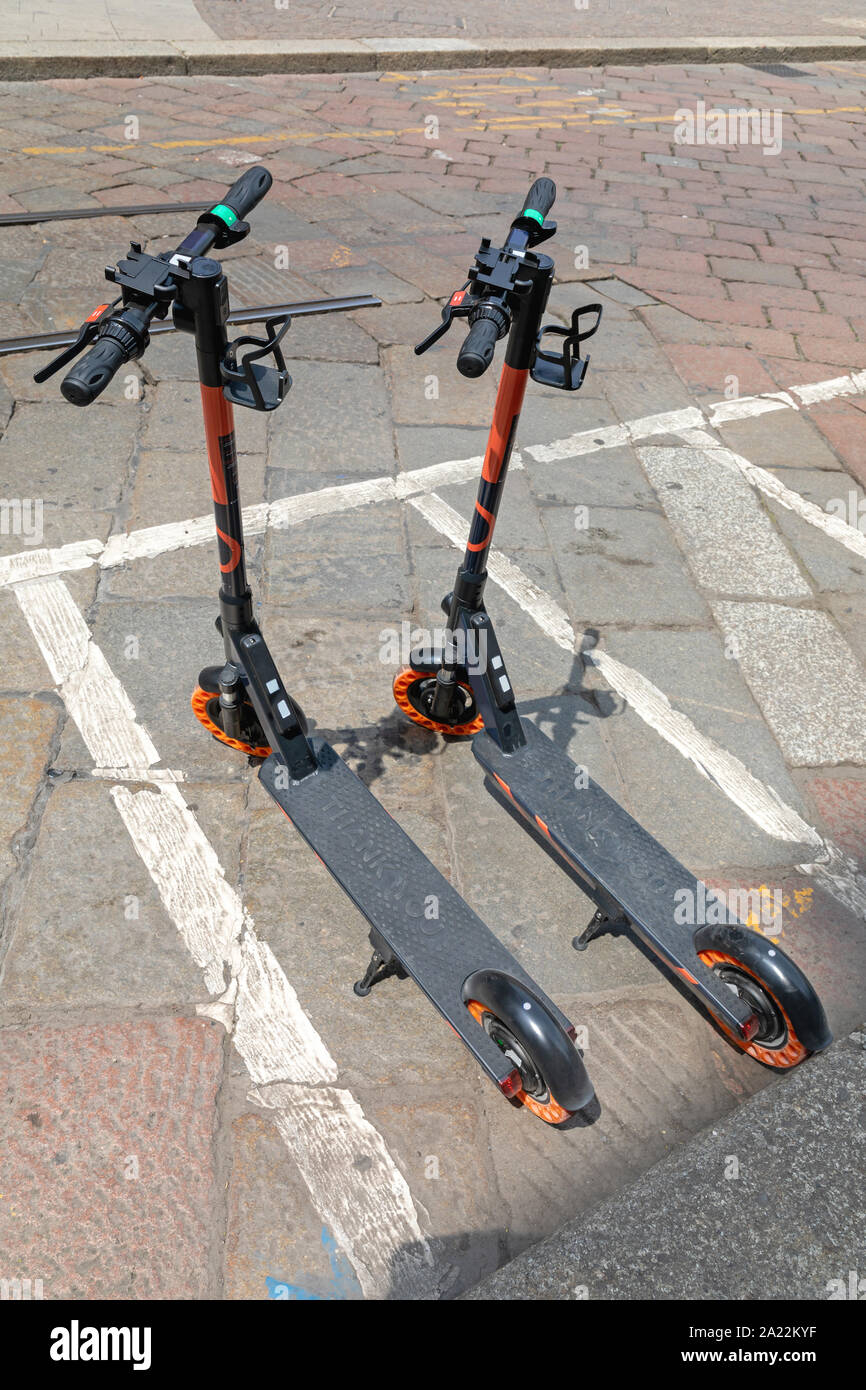 Electric Scooters for Rent Parked at Spot in City Stock Photo Alamy