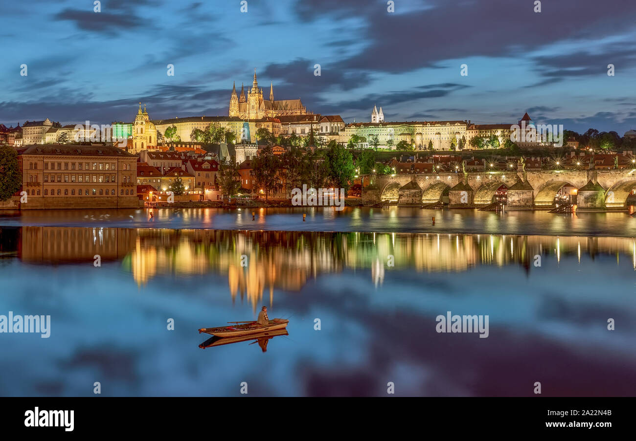 Prague cityscape amazing lights. Included tha old town, castle, moldva river and Charless bridge in this picture. Stock Photo
