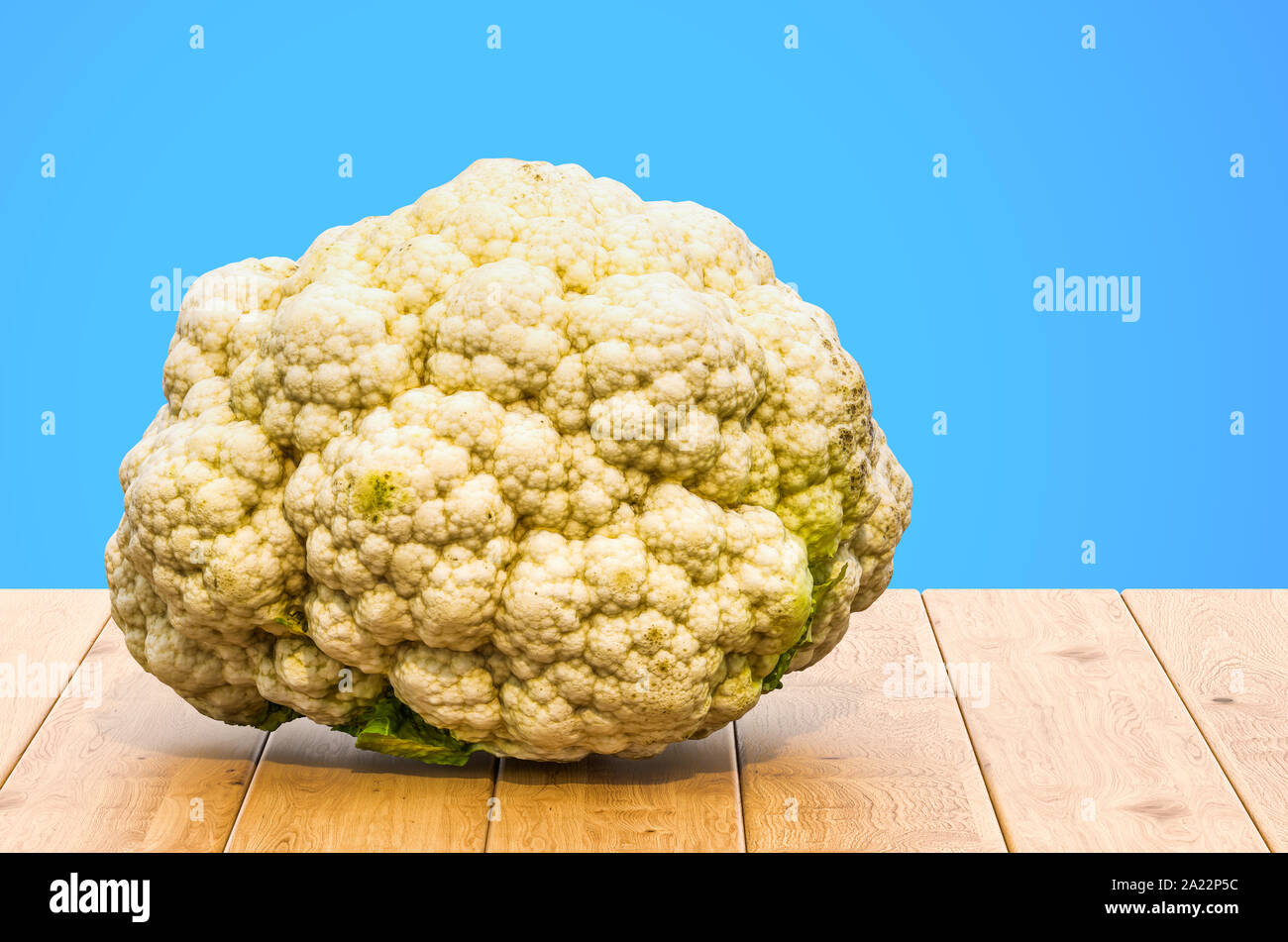 Cauliflower 3d rendering with realistic texture on the wooden table Stock Photo
