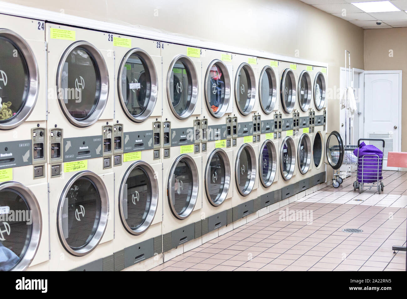 Miami, USA September 09, 2019 industrial washing machines in public laundromat, coin laundry