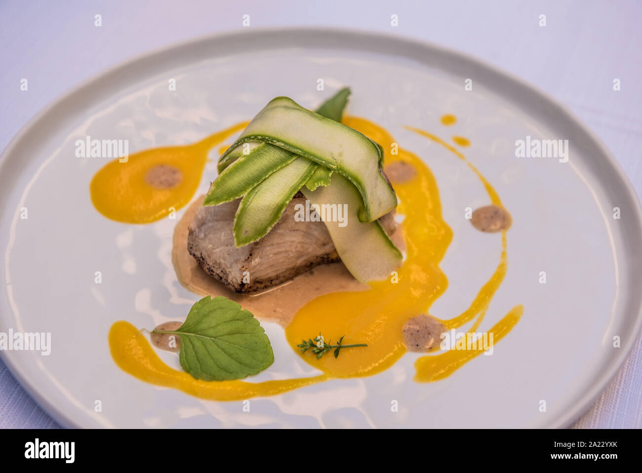 Swordfish fillet, cashew, carrot and ginger, bacon and zucchini Stock