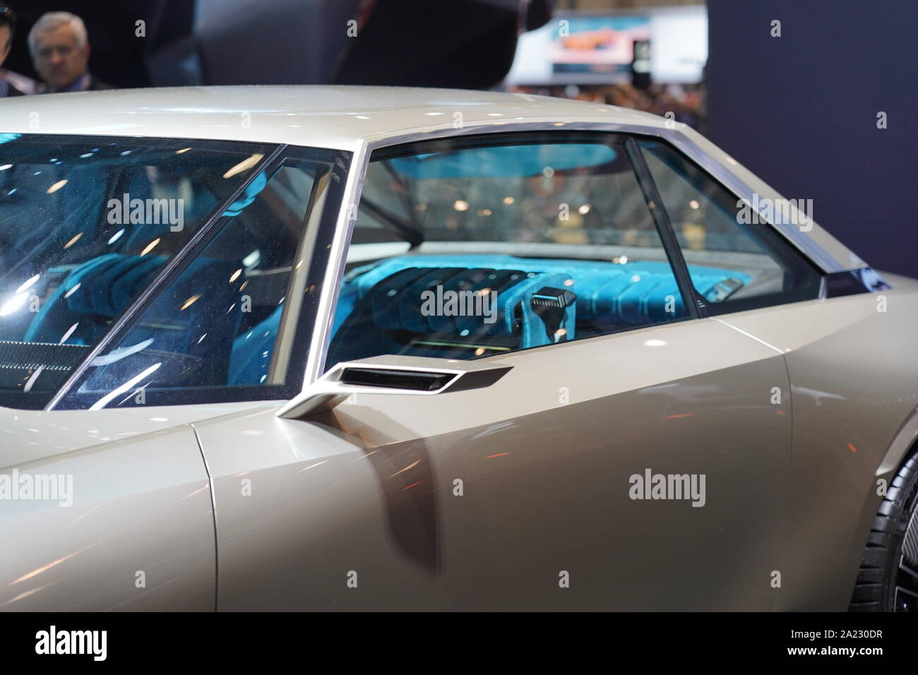 Eggshell colored electric car with vintage style with blue fabric interior at Autosalon Genf 2019 in Geneva, Switzerland Stock Photo