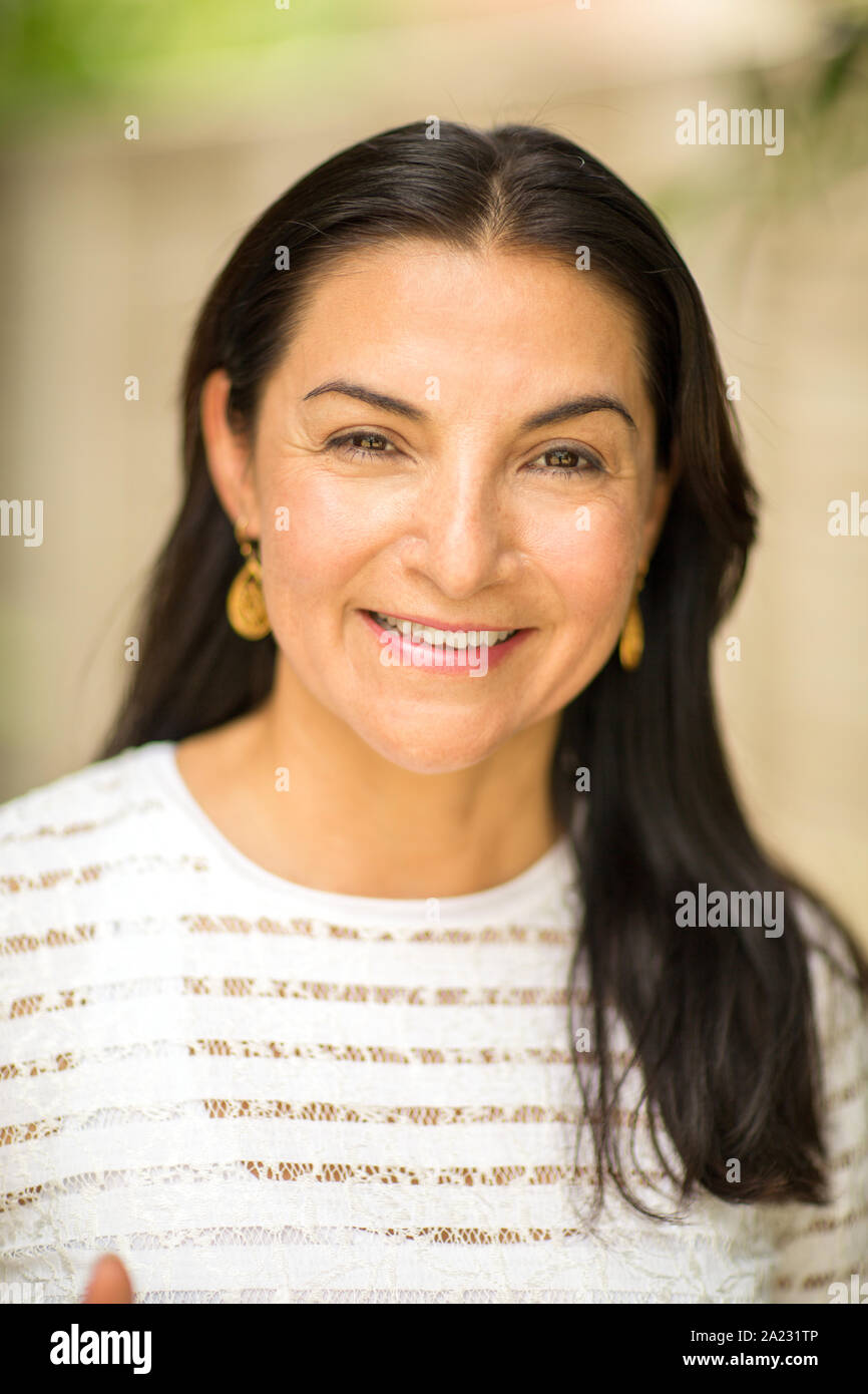Mature hispanic business woman hi-res stock photography and images - Alamy