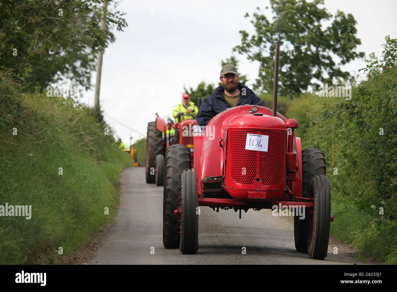 Red vintage tractor seen at a road run in Northern Ireland Stock Photo