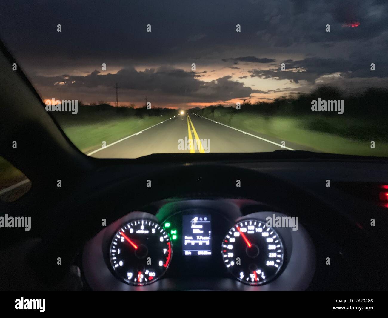 Road at night, car lights. .carretera en la noche, luces de auto Stock