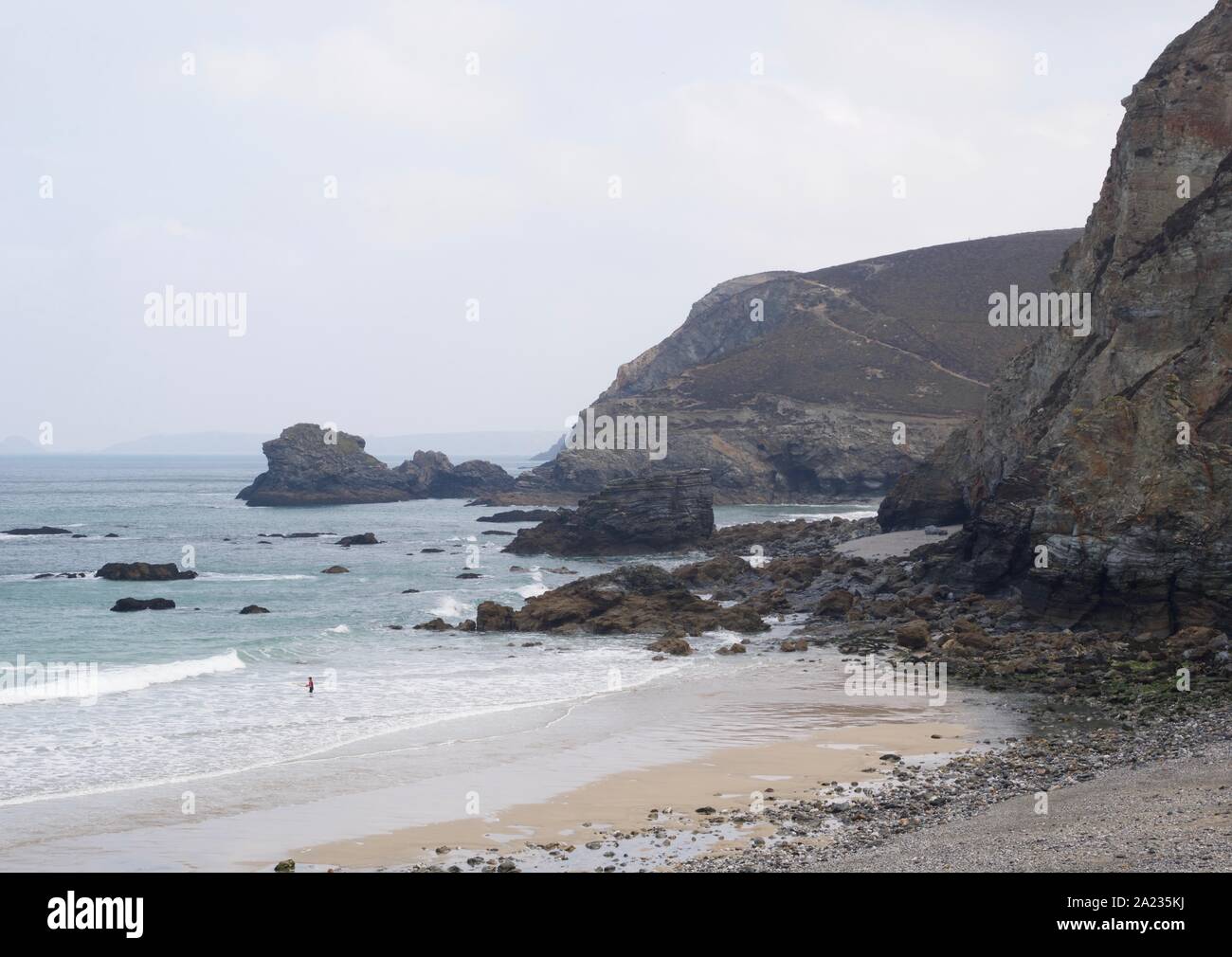 Rugged Seascape of North Cornish Coast with Sea Stacks. St Agnes, Trevellas Porth Cove on a Spring Day. UK. Stock Photo