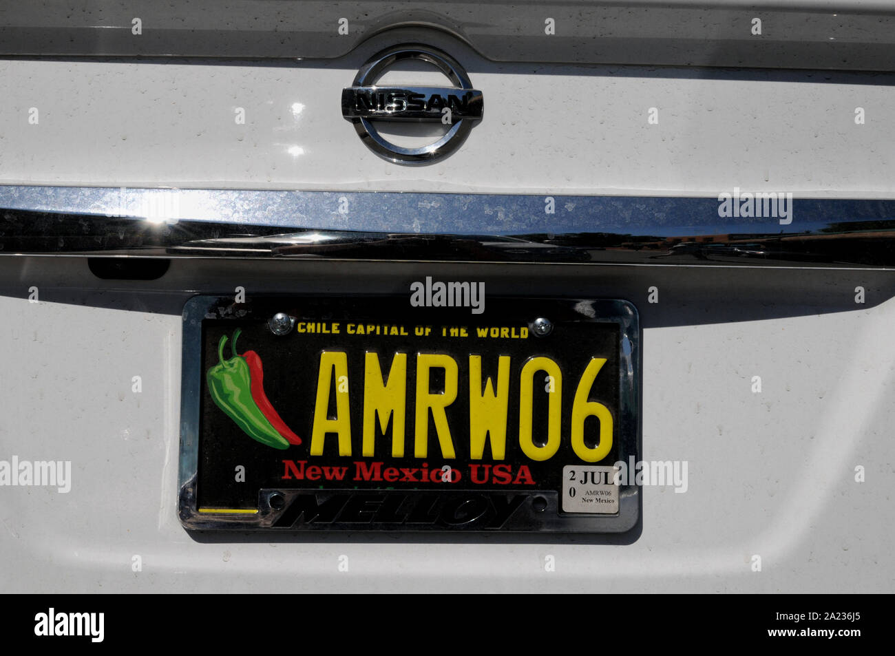 A car registration plate in Taos, New Mexico sums up the State's obsession with chili. Stock Photo