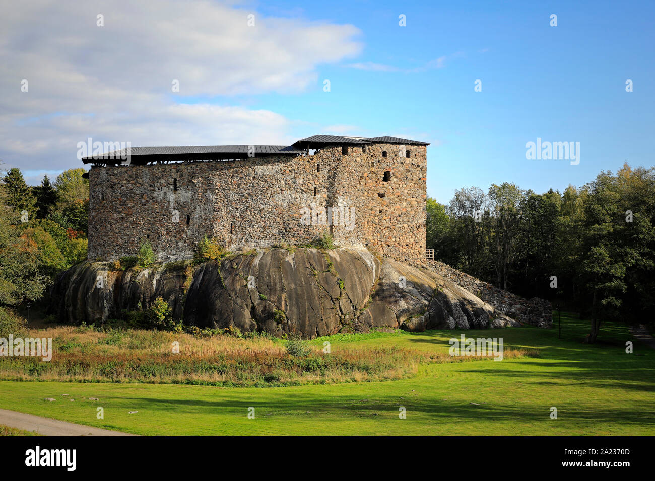 Medieval Raseborg Castle Ruins in autumn. Raseborg Castle was built in 1370s on a rock that was surrounded by water at the time. Snappertuna, Finland. Stock Photo