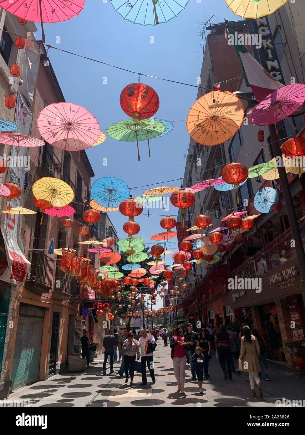 Street with decoration of popular festivals in the Chinatown of Mexico  City. calle con decoracion de fiestas populares en el barrio Chino de la  Ciduad de Mexico. dragon, dragon chino, estatua, felino,