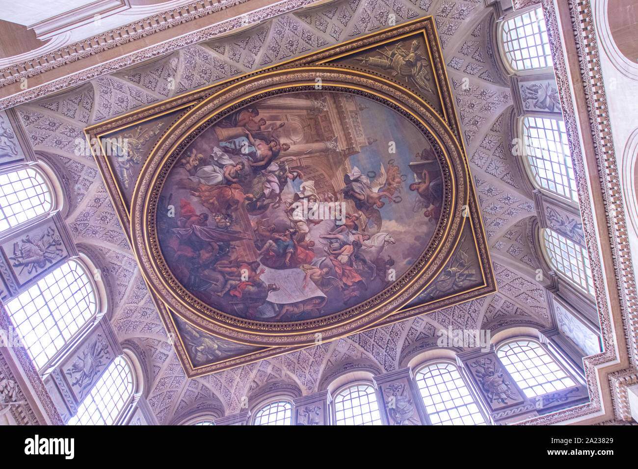 Beautiful decorative ceiling inside Blenheim Palace. Here Maurizio Cattelan's famous 18 carot Golden toilet art exhibit was stolen Stock Photo