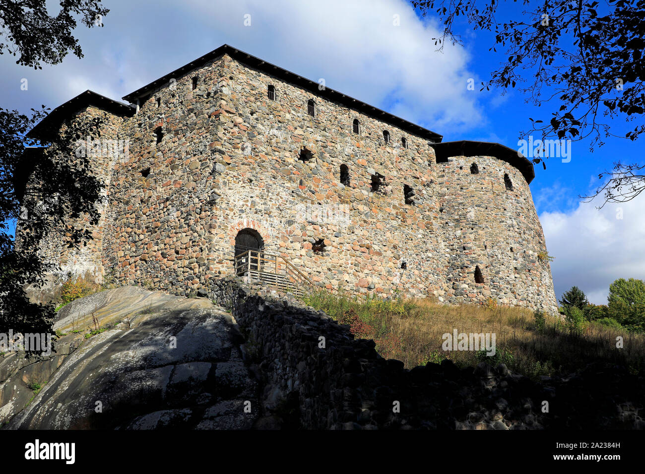 Medieval Raseborg Castle Ruins against sky in autumn. Raseborg Castle was built in 1370s on a rock that was surrounded by water at the time. Snappertu Stock Photo