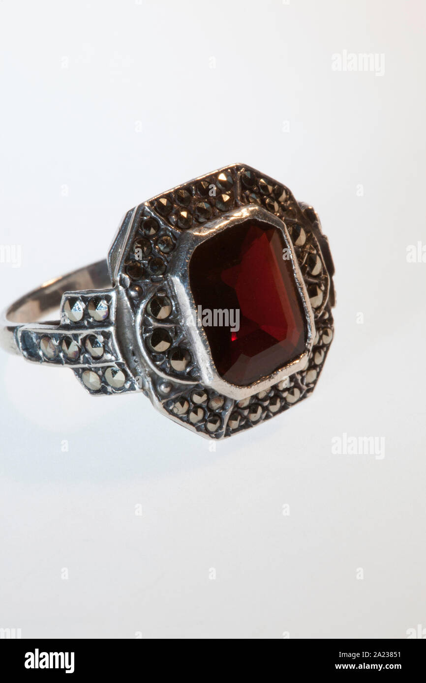 garnet ring surrounded by marcasites set in silver 2A23851