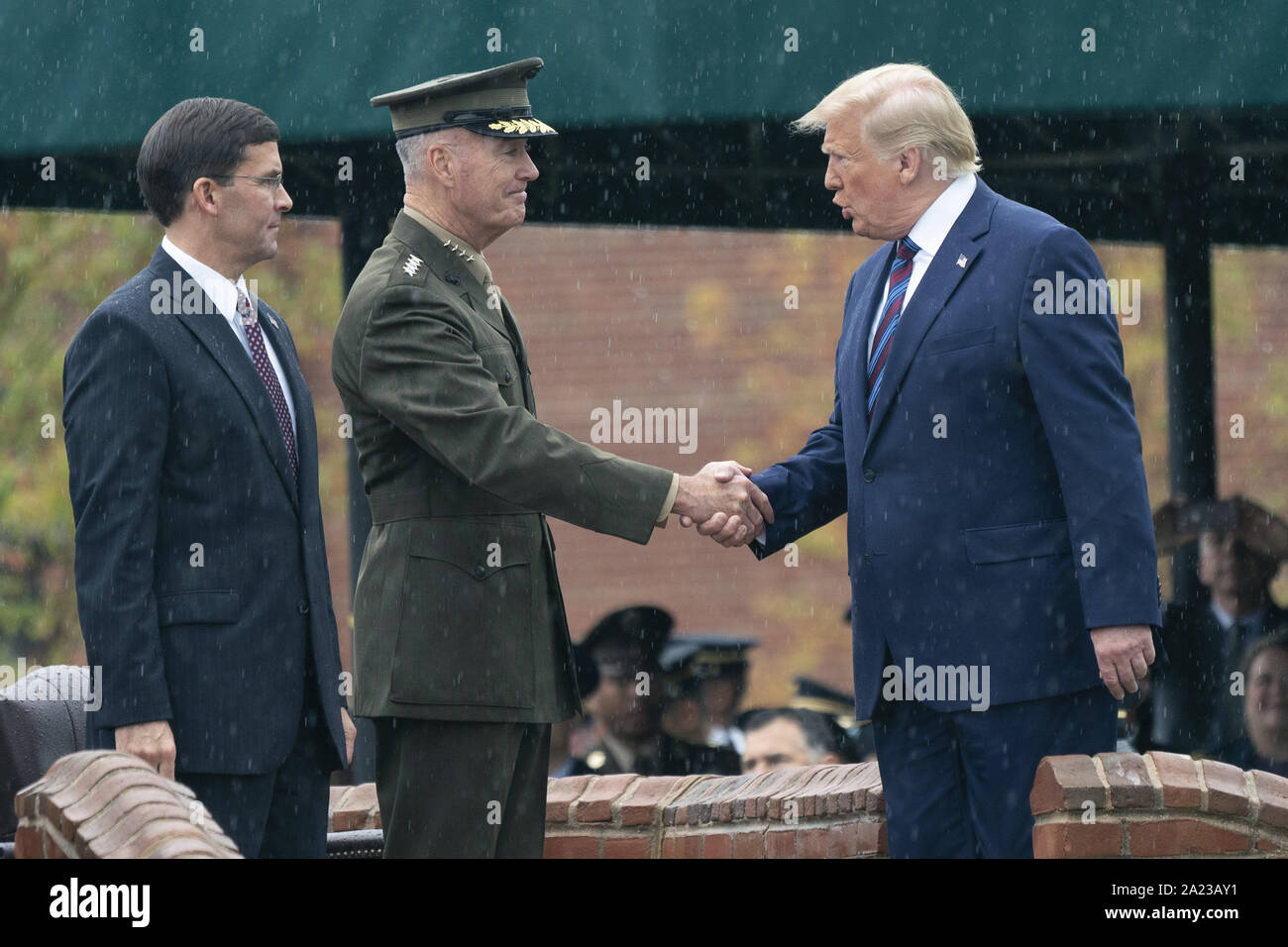 Arlington, United States. 30th Sep, 2019. United States President Donald J. Trump greets outgoing Chairman of the Joint Chiefs of Staff General Joseph Dunford during the Armed Forces Welcome Ceremony in honor of the Twentieth Chairman of the Joint Chiefs of Staff Mark Milley at Joint Base Myer in Arlington, Virginia on September 30, 2019. Photo by Chris Kleponis/UPI Credit: UPI/Alamy Live News Stock Photo