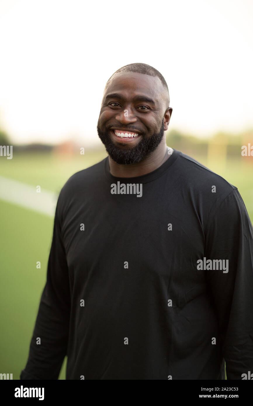 portrait-of-an-african-american-football-coach-smiling-stock-photo-alamy