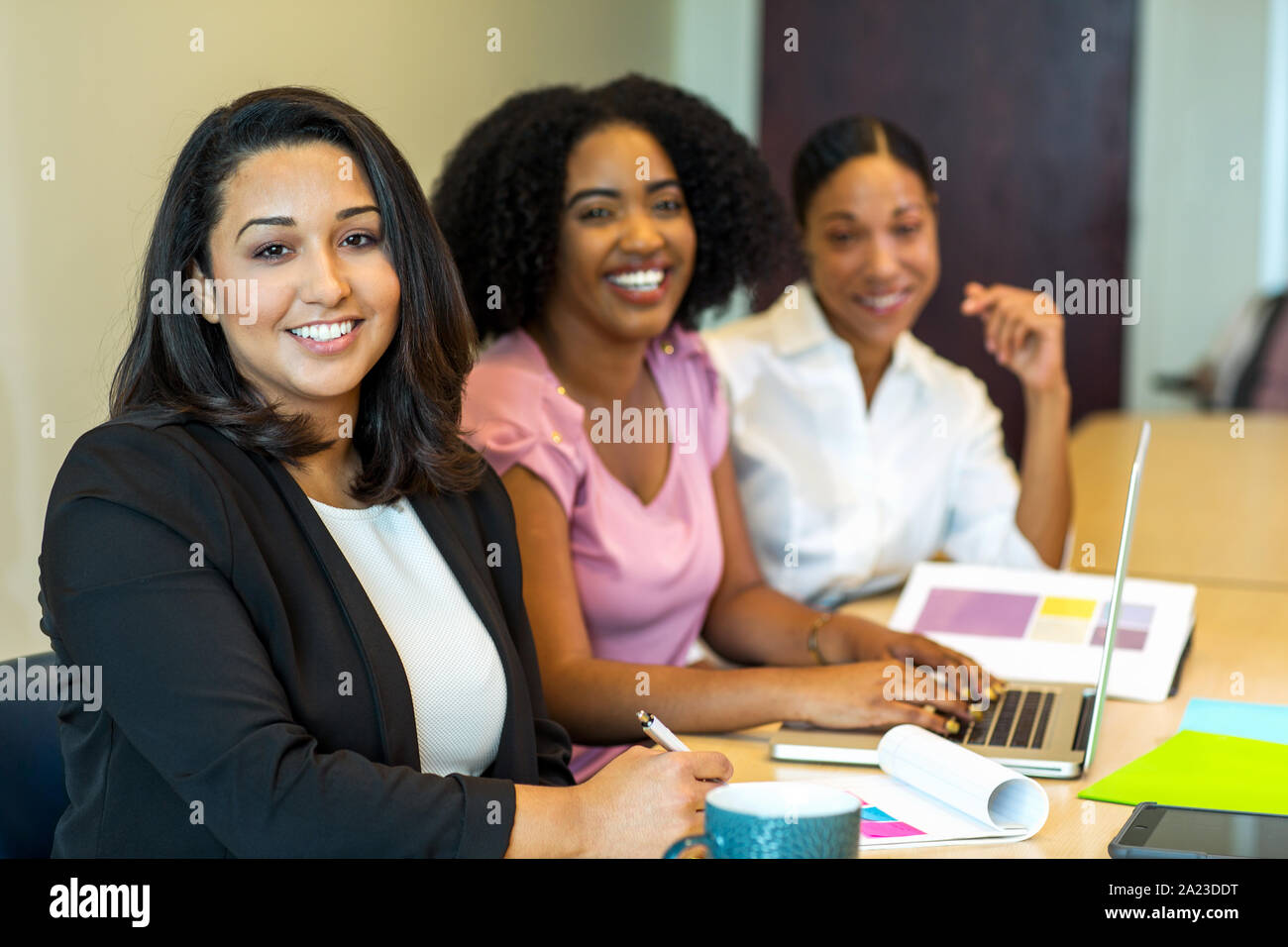 Multi ethnic group of women at work Stock Photo - Alamy