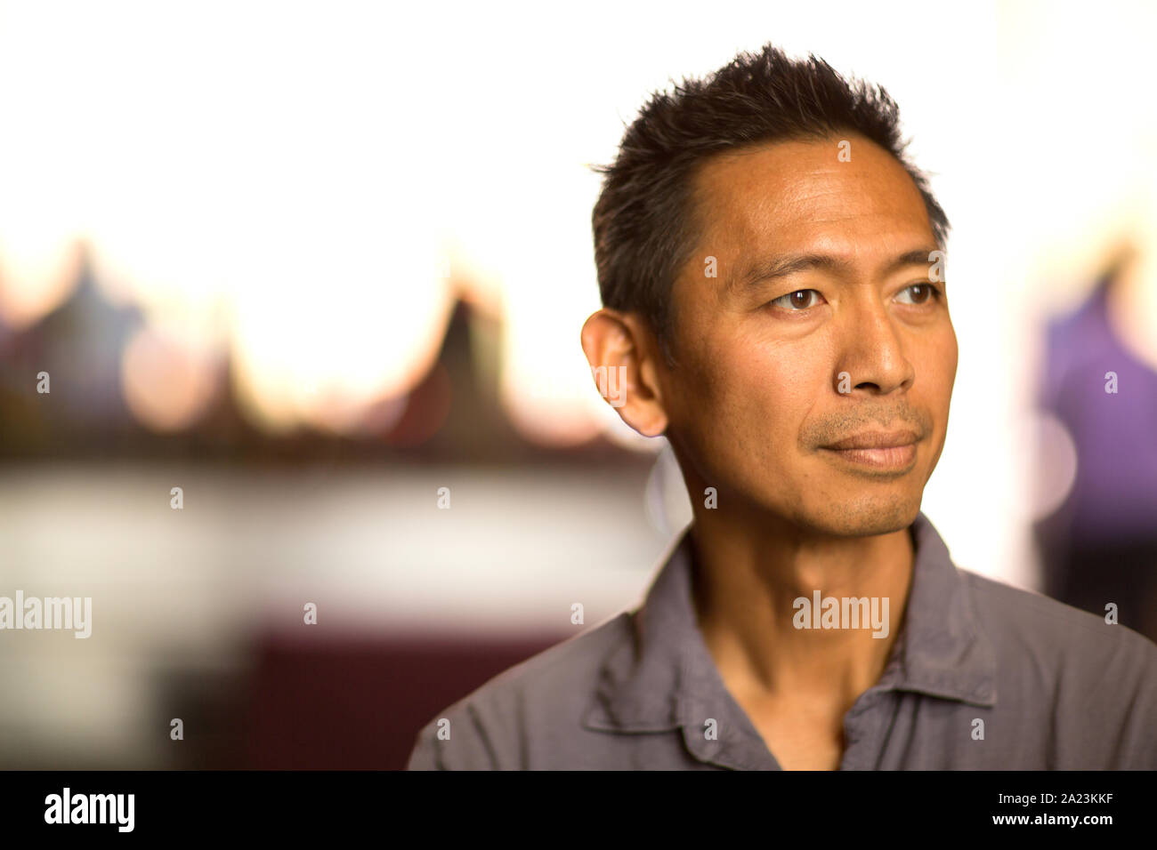 Portrait of a healthy middle age Asian man smiling Stock Photo - Alamy