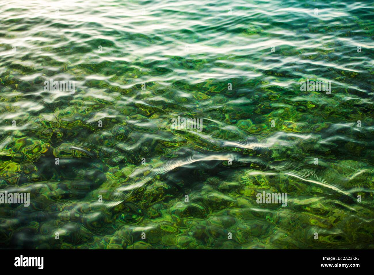 Crystal Clear Lake Water. Nature Details Photo Background. Stock Photo