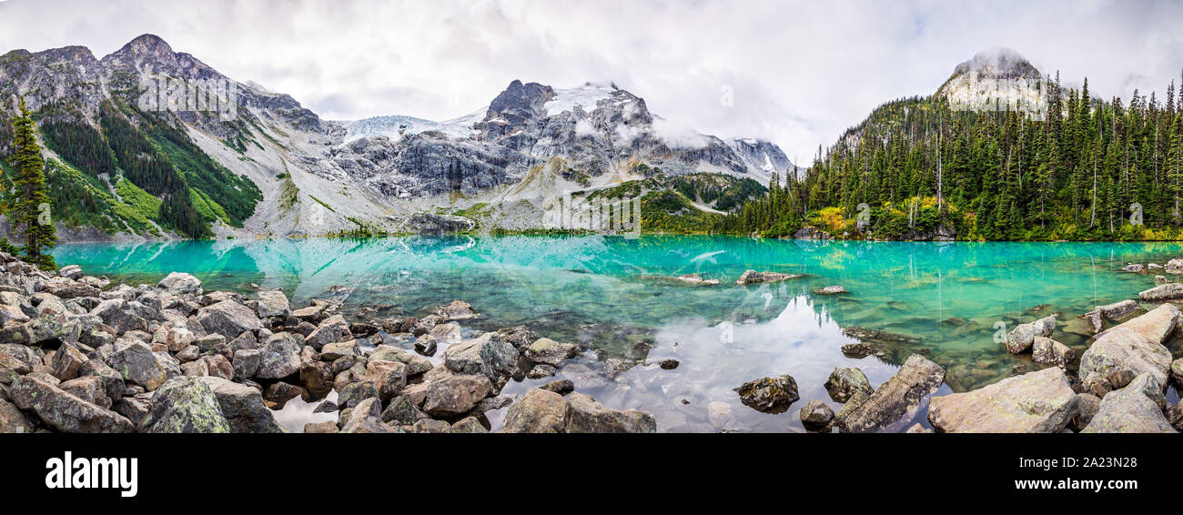 Daytime Mountain Panorama with Beautiful Turquoise Glacier Fed lake. Joffre Lakes Provincial Park, British Columbia, Canada Stock Photo