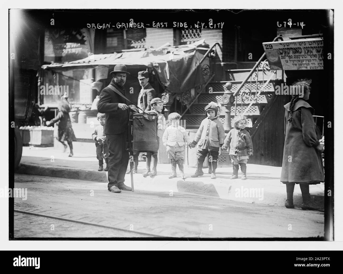 Organ Grinder On Street, East Side, New York Stock Photo - Alamy