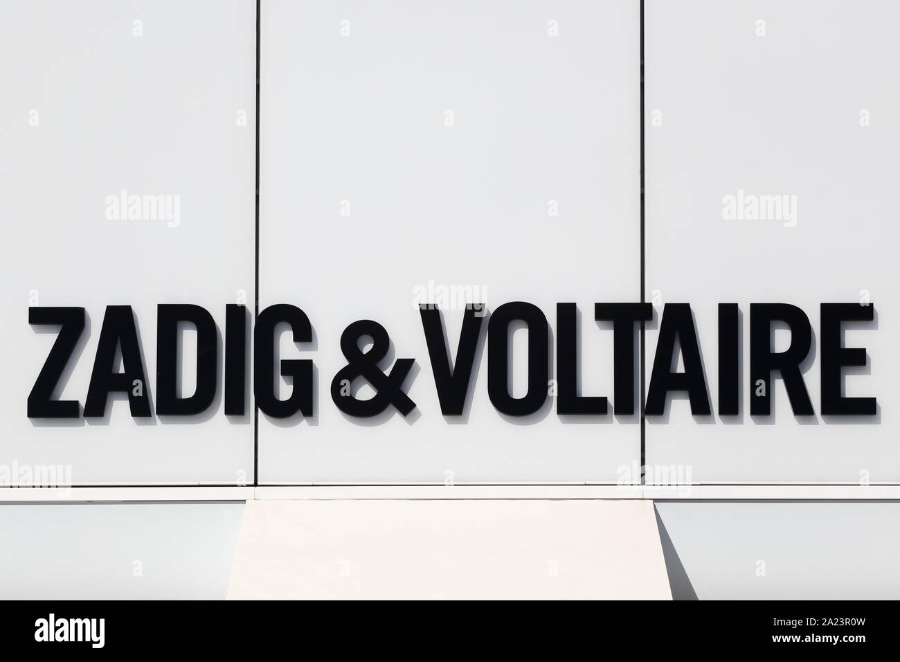 Villefontaine, France - September 13, 2019: Zadig & Voltaire logo on a  wall. Zadig & Voltaire is a French ready-to-wear brand created in 1997  Stock Photo - Alamy