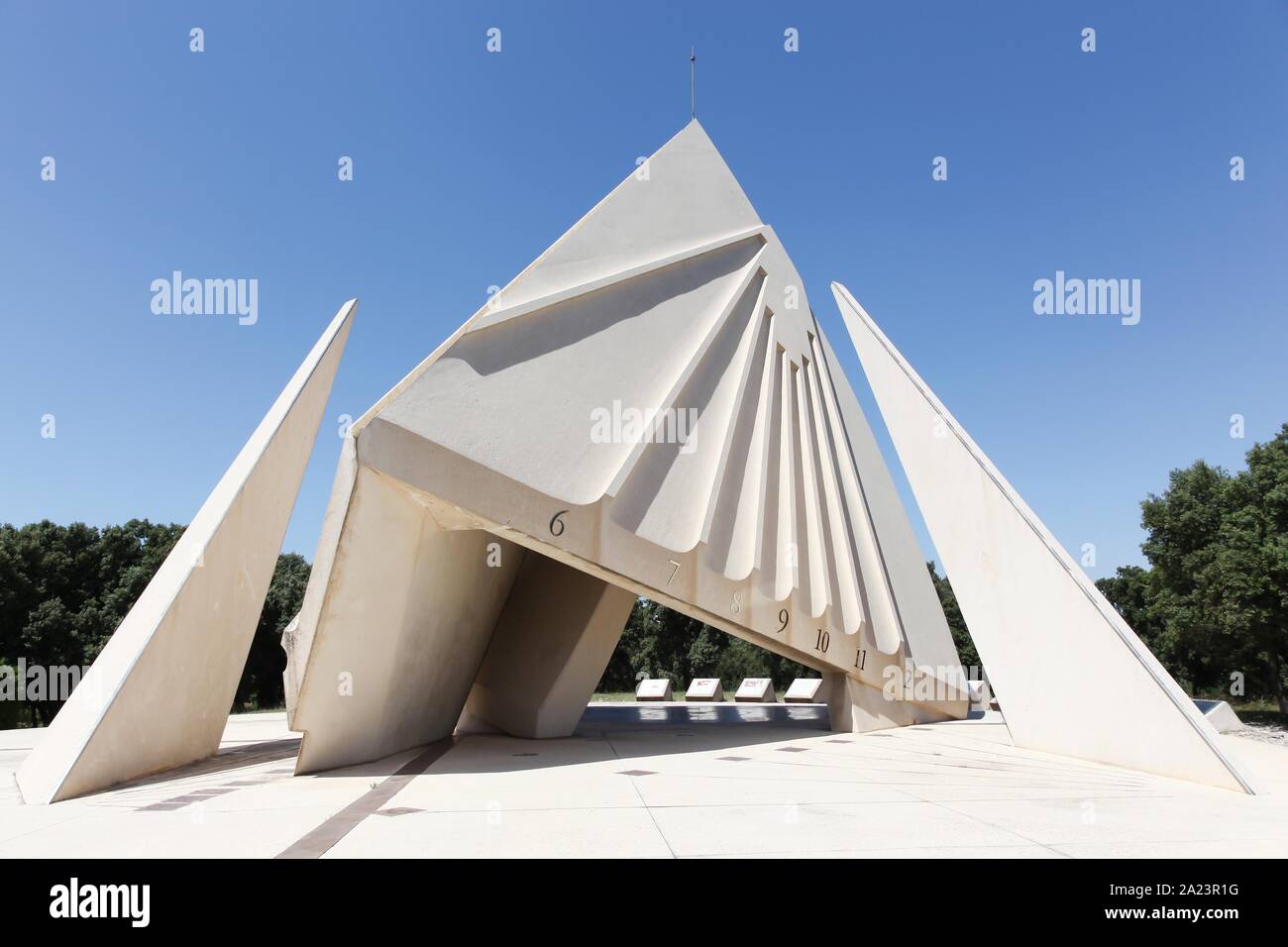 Tavel, France - July 1, 2018: Big sundial installed on the edge of the A9 motorway on the rest area of Tavel Nord, in Tavel, France Stock Photo