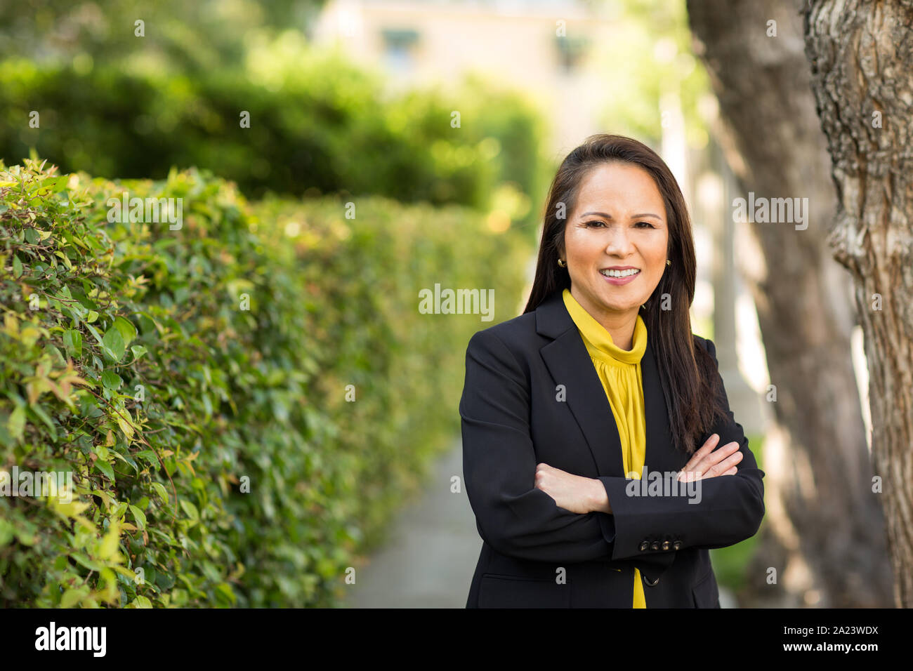 Portrait of a mature Asian woman in a business suit. Stock Photo