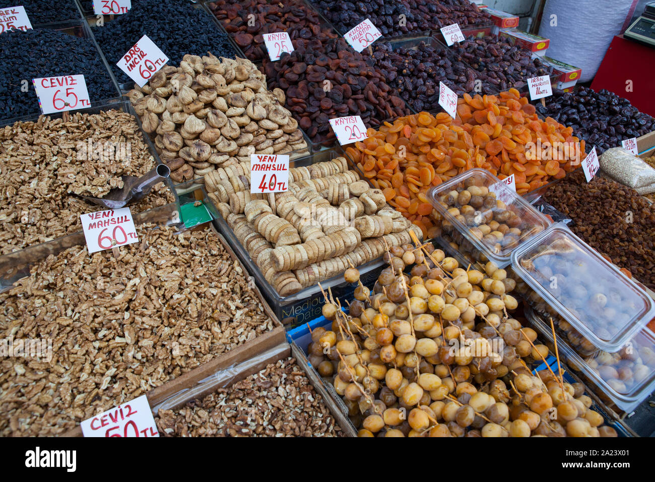 Display of nuts and dried fruit at a market stall in the Fatih district of Istanbu Stock Photo
