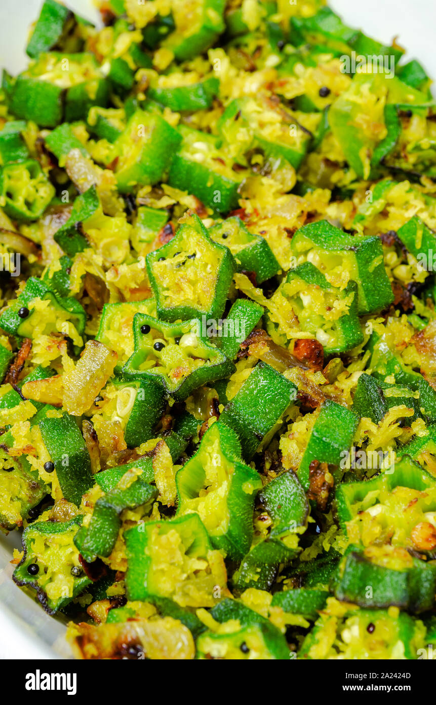 Closeup of Okra Stir Fry with grated coconut and mustard in a dish Stock Photo