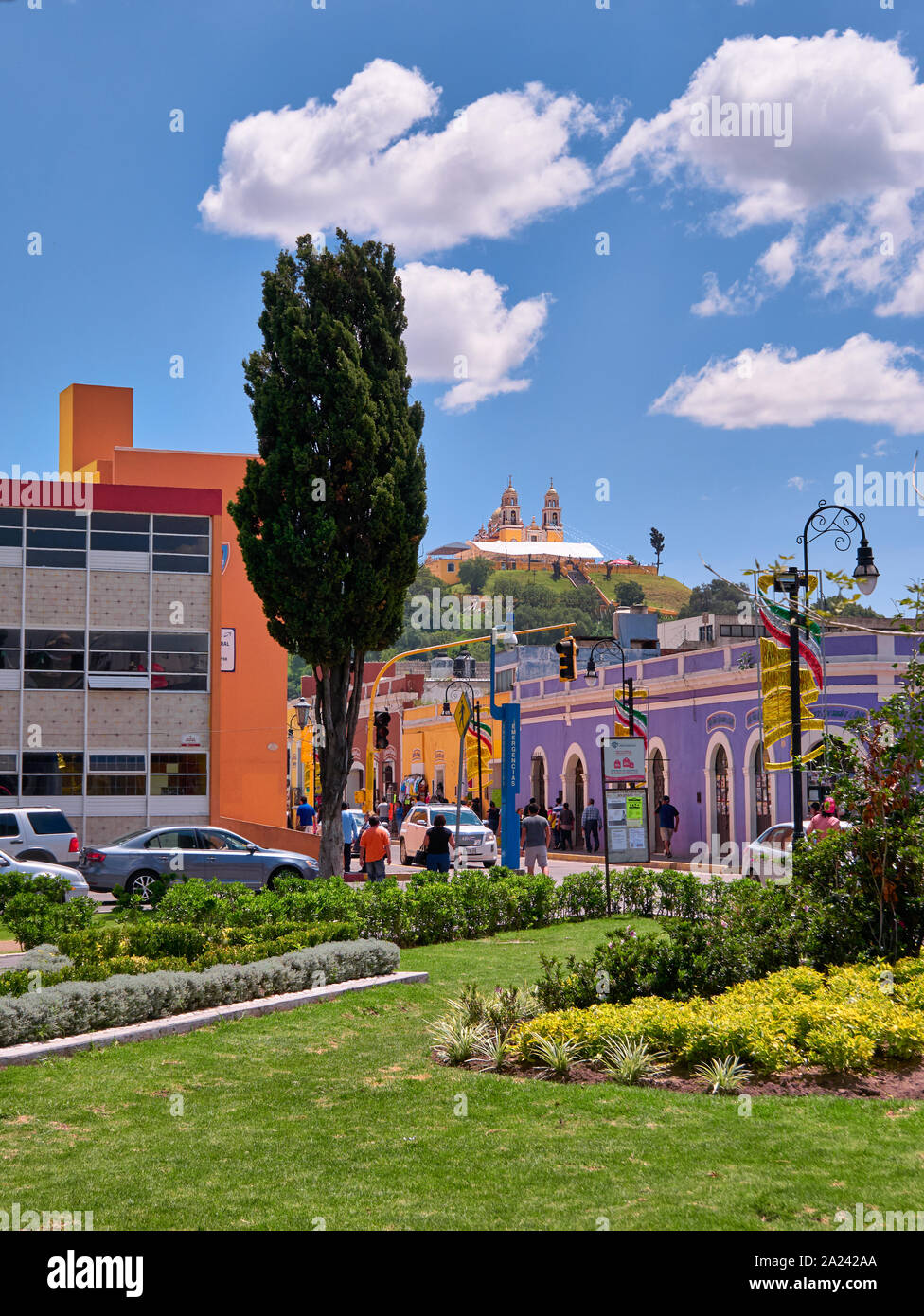 San Pedro Cholula, Mexico, September 30, 2018 - View of San Pedro Cholula center and Plaza de la Concordia Garden with Shrine of Our Lady of Remedies in background. Stock Photo